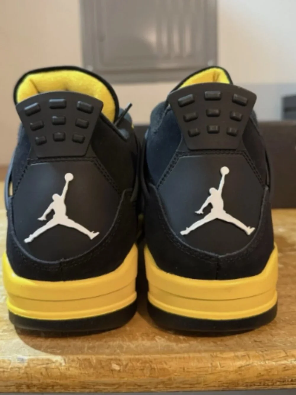 Men’s Nike Air Jordan 4 Retro Thunder Black Yellow Sneakers
